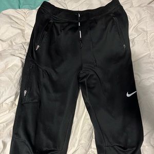 Black Nike dri fit joggers, Reflective.